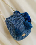 Bucket bag with Pom Poms